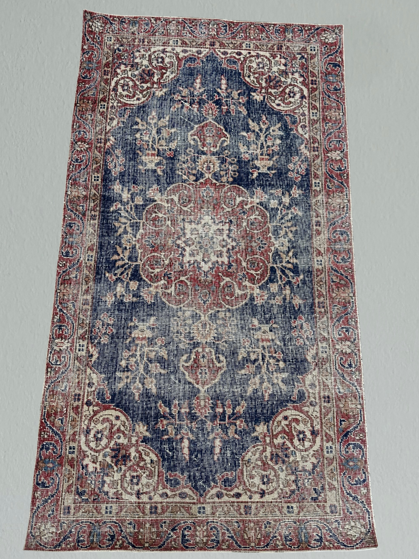 Red & Navy Vintage Handwoven Wool Rug – 109.5x202.5 cm (43.1"x79.7") – Faded Central Medallion Design – Turkish Rug for Living Room or Hallway